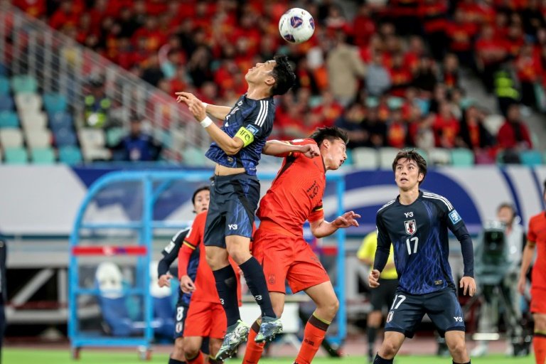 japan-on-cusp-of-world-cup-as-son-scores-in-palestine-draw