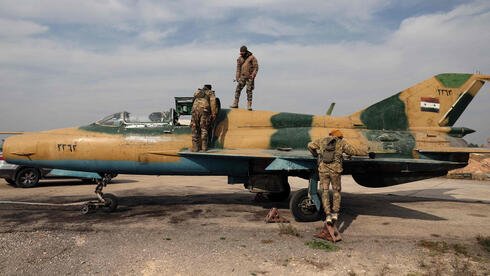 Syrian rebels rally toward Homs, threatening third major city in country