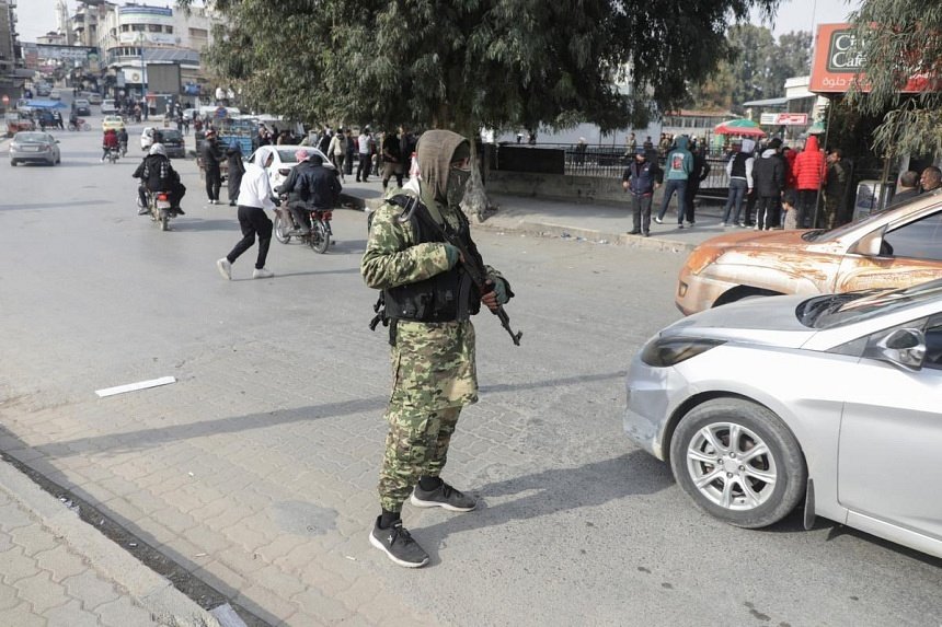 syrian-rebel-assault-widens-as-assad-races-to-defend-homs,-damascus