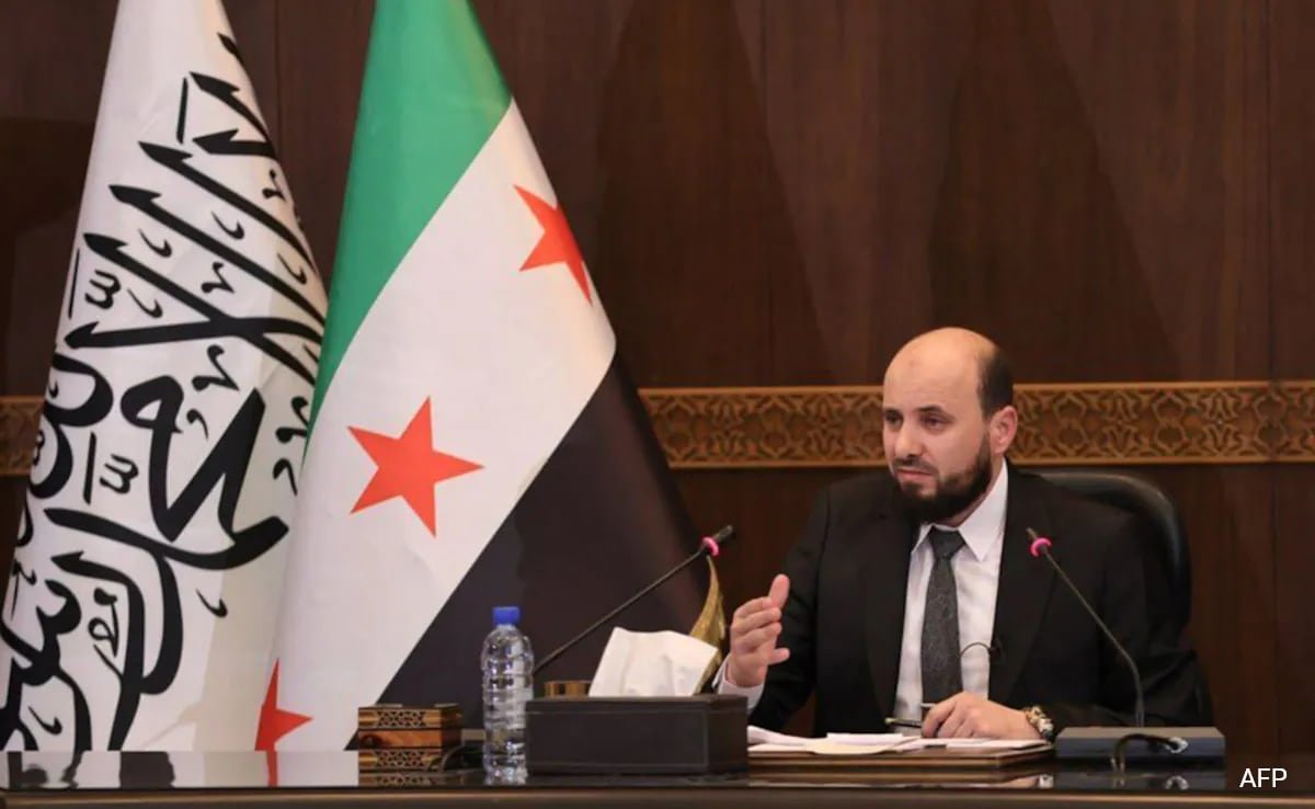 new-syria-pm-says-will-“guarantee”-all-religious-groups’-rights