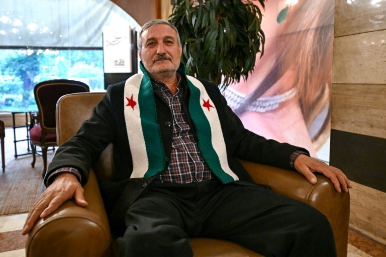 back-in-damascus,-rebel-leader-confident-of-post-assad-unity