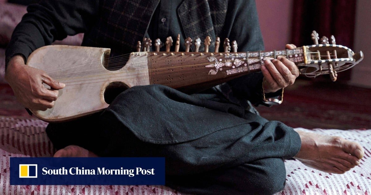 the-afghans-making-music,-and-musical-instruments,-in-defiance-of-ban-by-taliban