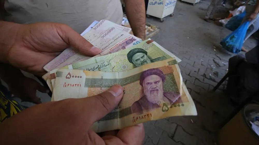 iran’s-parliament-fires-minister-of-economy-over-plummeting-rial,-mismanagement